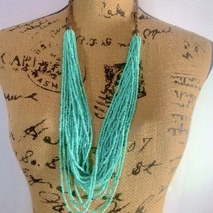 Turquoise and brown macrame statement necklace